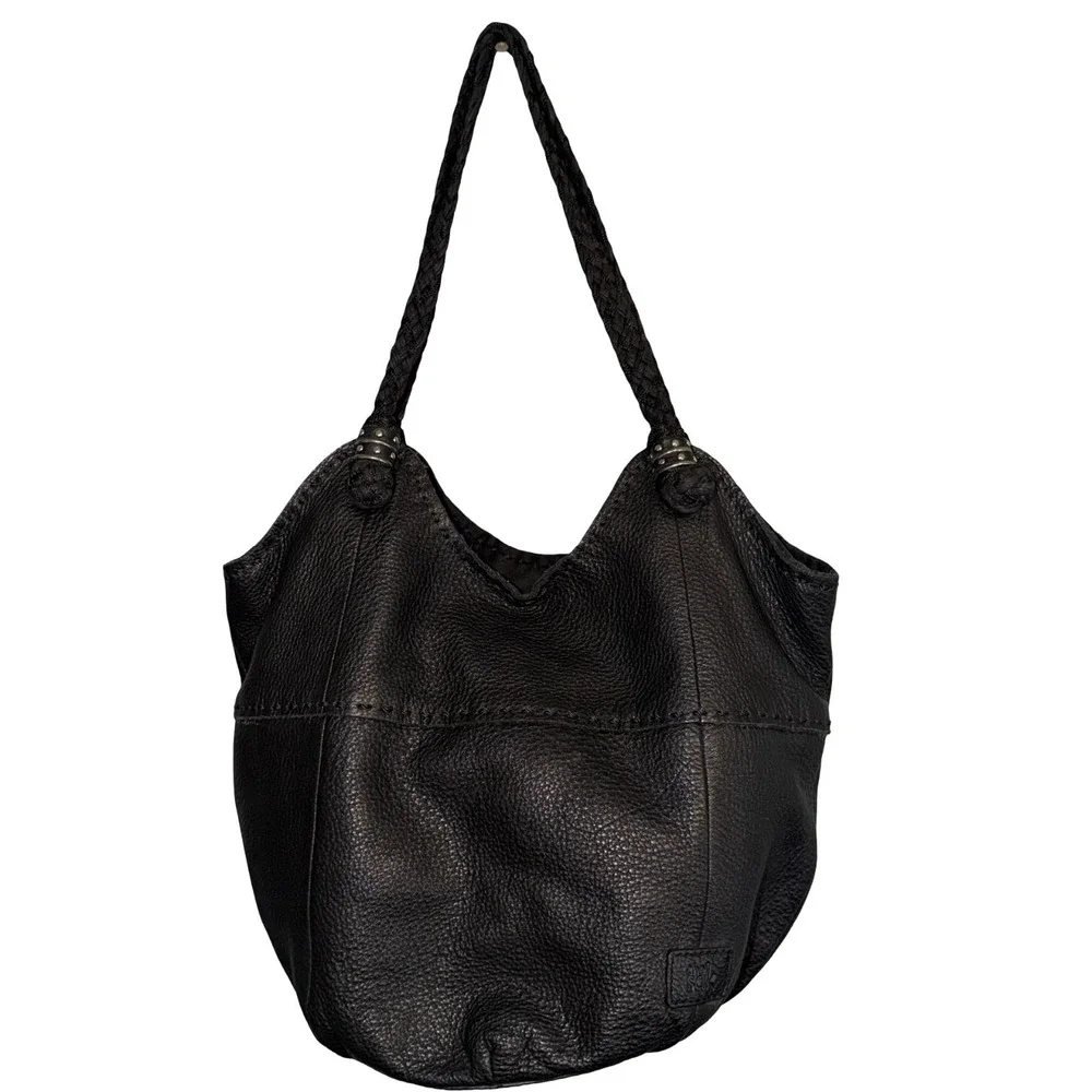 The Sak Indio black leather hobo bag, braided shoulder straps